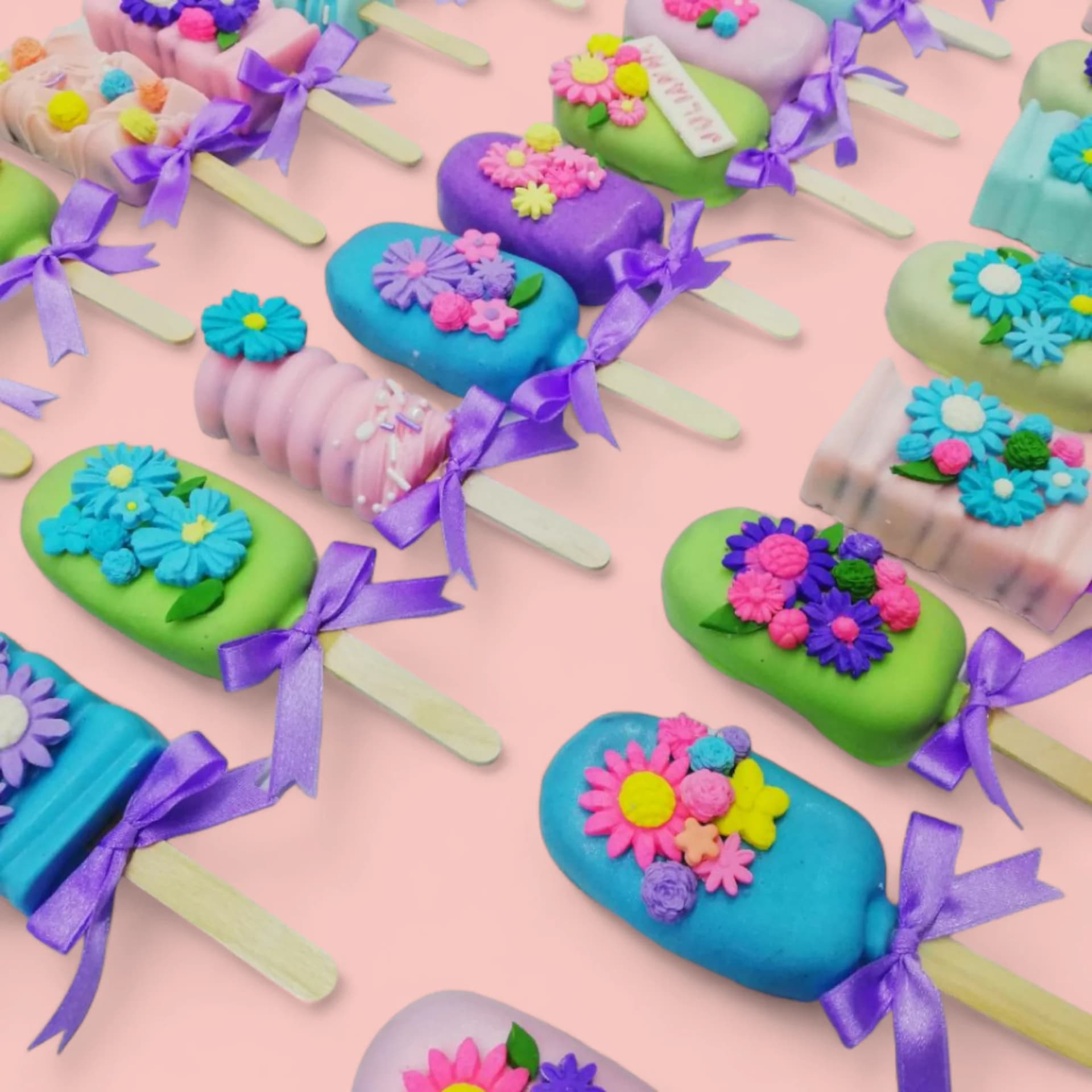 Encanto-Themed Cakesicles by Love Bites Cake Hub